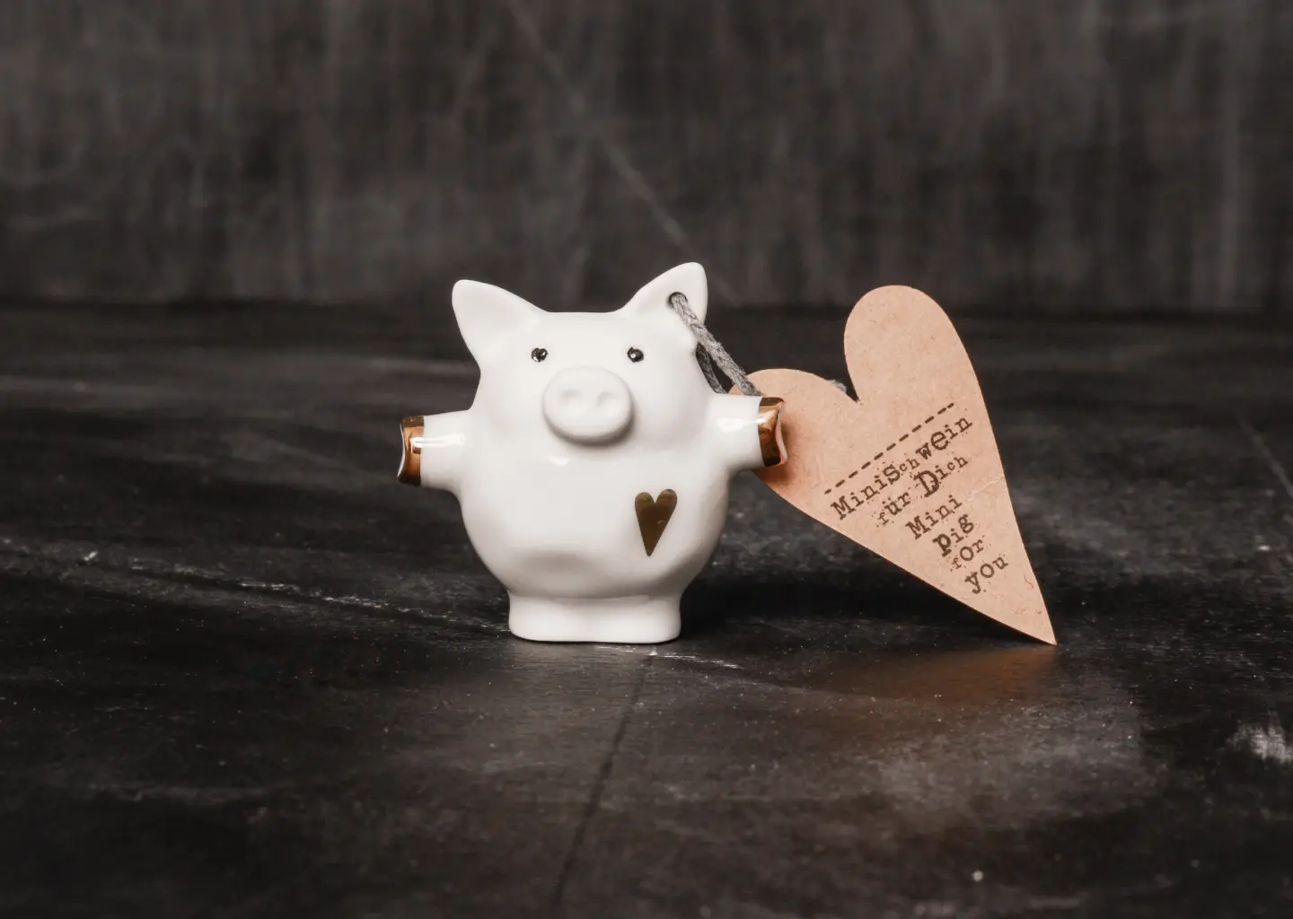 Mini Schweine. Herz gold.